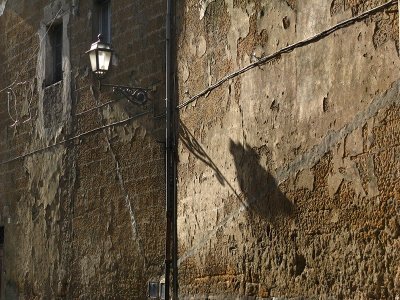 Light and shadows on an ancient wall .. A4876