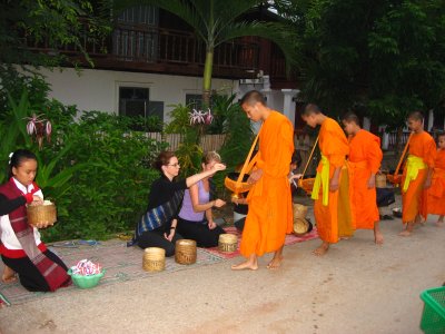 giving alms to the monks in the morning