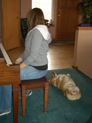 Charlie loves listening to Rebecca play the piano