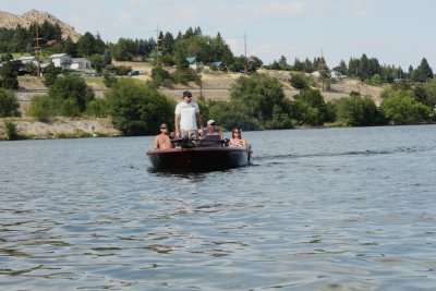 Don bringing his boat to the sand bar