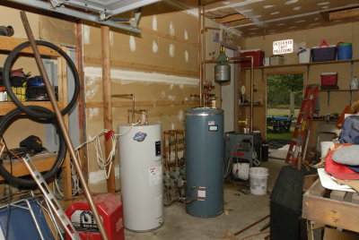 Electric HW Heater Operating in Garage Permanently