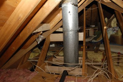 Chimney Going Through Garage/Laundry Room Attic