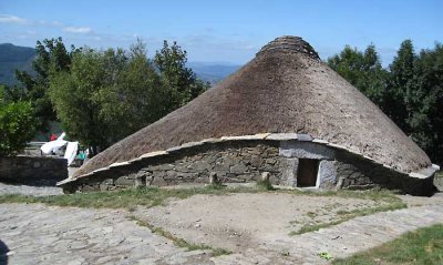 a palloza straw roofed dwelling