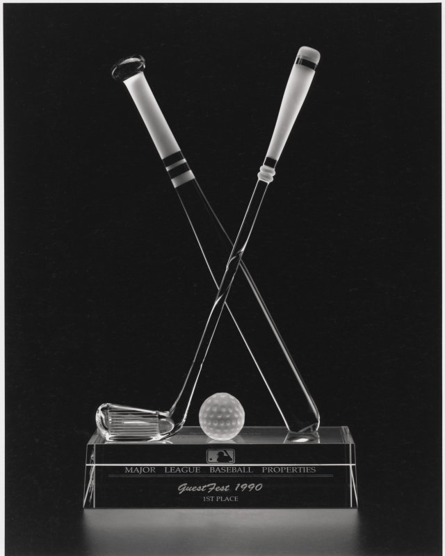 Crossed Bat and Golf Club