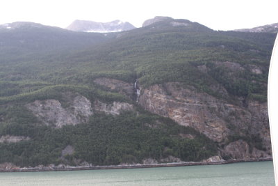 waterfall @ left, marks made by glacier and glacier at top.JPG
