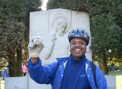 Africa Marshall places the 5BBC sign ball at the grave of Babe Ruth