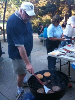 Master Chef Jere Ingram finishes out the first batch of burgers from the grill