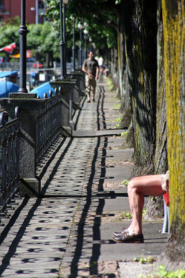 Legs and shadow along the lake