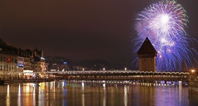 Firework next to Chapell tower and woden bridge, Lucerne