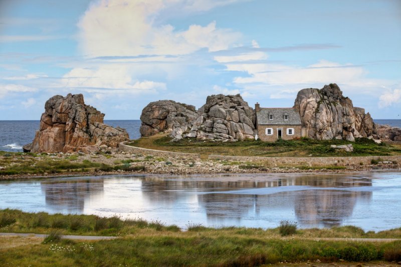 The famous house between rocks at the Cte de Granite Rose