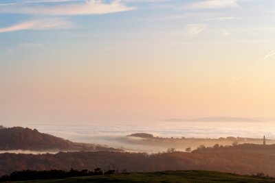 above the mists - Midsummer Hill left, May Hill horizon, obelisk right