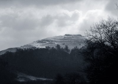 Herefordshire Beacon showing its former life as an Iron Age 'British Camp' in snow