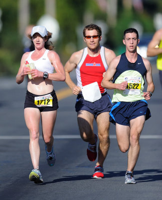 Connie Seigh, left, 1st place female, 1:25:45