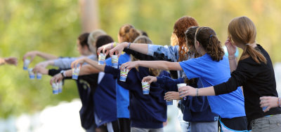 Passing out water cups