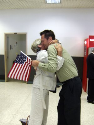 Actually, she was hugging every American, she was just happy to be off the plane.jpg