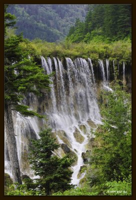 005 Jiuzhaigou 0917 Nourilang Waterfall.jpg