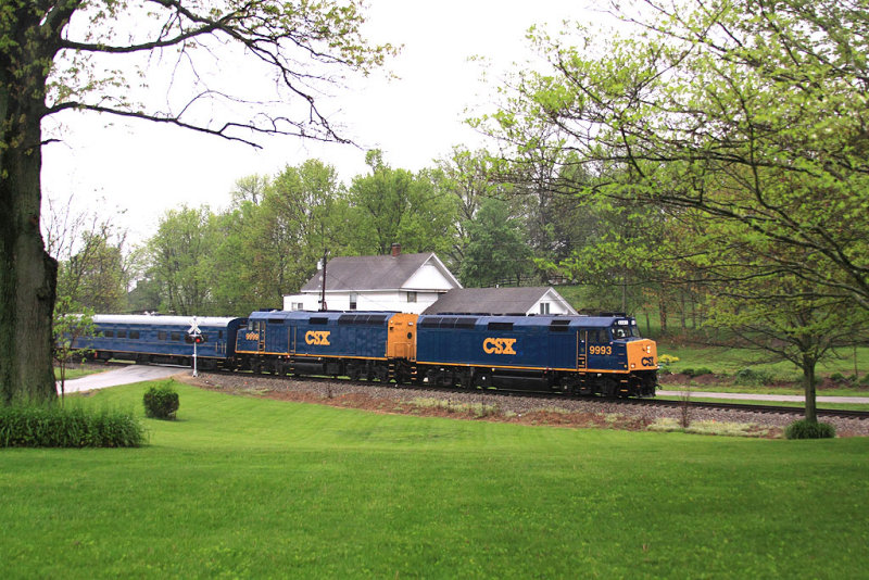 The CSX Derby train rolls through Duckers Station in the rain