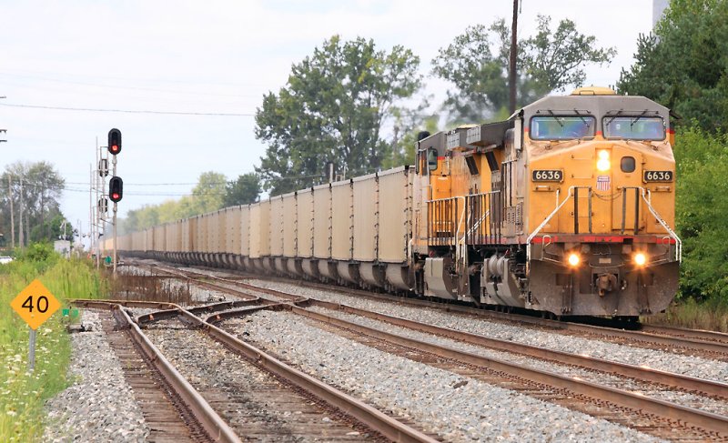 UP power on a Eastbound coal train crosses the I&O 