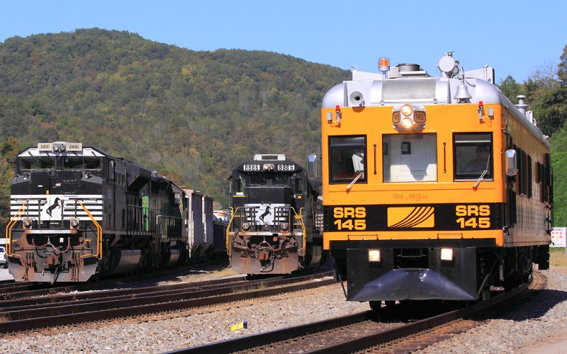 SRS 145 is testing on Southbound on #1 track, passing a pair of trains at Oakdale 