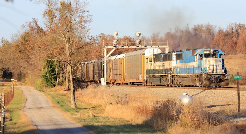 NS 197 just beats the shadows as they  leave Bowen, late on a fall evening. 