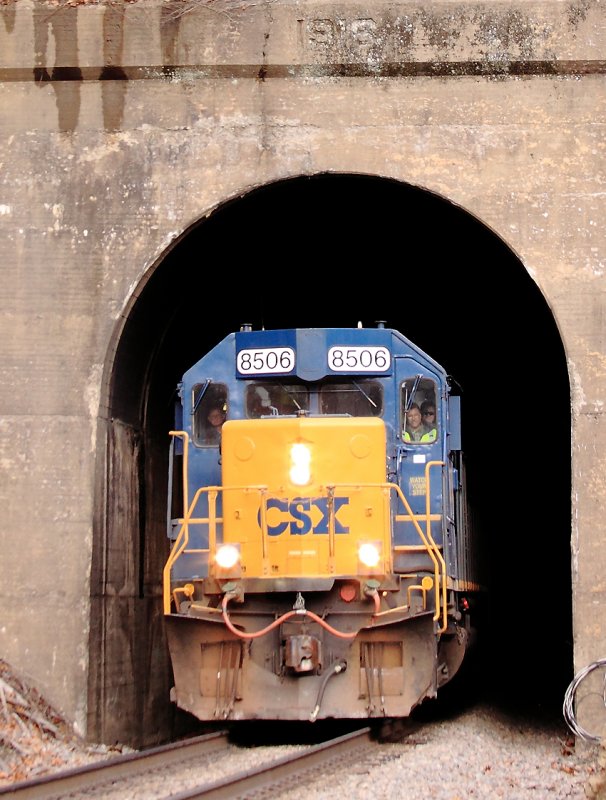 The Santa Train emerges from the short tunnel at McClure 