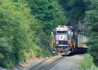 Pushers on the rear of a Eastbound coal drag starting down the slide 