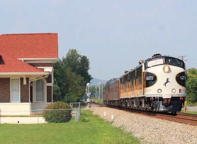 956 sprints down the valley, passing the CS depot at Spring City TN 