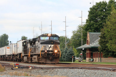 An Eastbound NS intermodal passes the old Big Four Depot at Wauseon Ohio