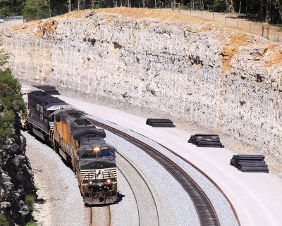 NS 161 eases through the newly widened cut at Antioch 