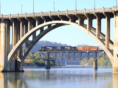 The Southbound NS K&A local crosses the TN river, framed by the Henley Street Bridge 