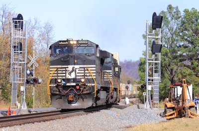 NS 215 passes the new signals at Milledgeville, with the old signals seen in the background