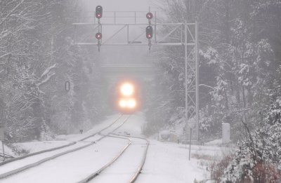 Westbound NS 68R grinds uphill through a mix of snow and freezing rain at East Waddy