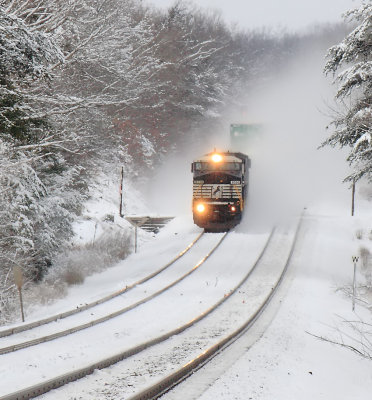 NS 215 crosses into TN, leaving a self created whiteout in its wake 