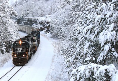 A EMD Trio makes for a fine sight, leading a Southbound grain train 