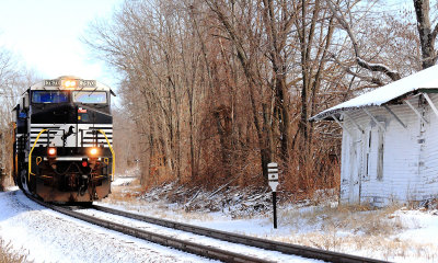 Westbound 239 passes the old depot at Clarks Station 