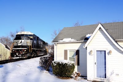 NS 6800, in fresh paint, leads 111 through Hogtown