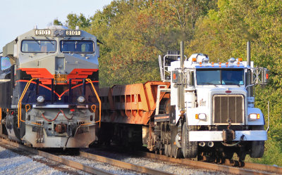 A NS Brandt truck with 3 empty air dump cars passes 61A as it waits for a Louisville cew at the wye. 