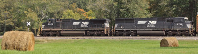 The last hay of the year sits in the field at Southfork as 224 passes by 