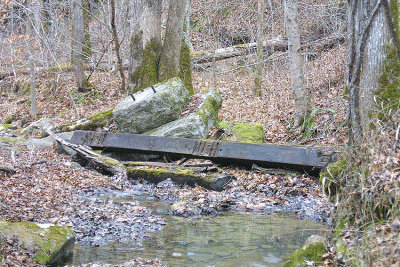 Bridge timbers and concrete base of the old CNO&TP bridge over Gut Lick Creek, near Alpine Ky