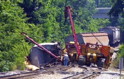 R.J. Corman crews work to rerail 5 loaded covered hoppers at East Waddy Ky.
