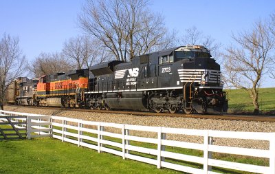 NS 2703 leads train 3G at Vanarsdale Ky .