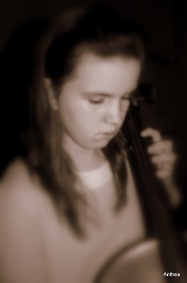 my sweet Sarah playing her cello