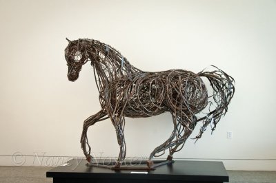 Made of alder wood, steel and wire.