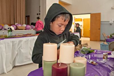 Miles took plastic wrapping off the candles