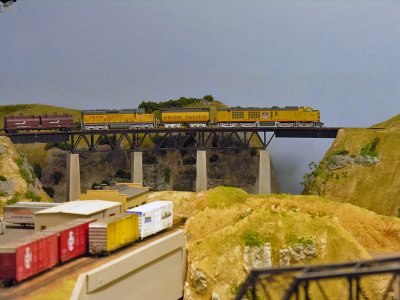 UP Gas Turbine set with the SD24 negotiates the bridge over the far end of the layout