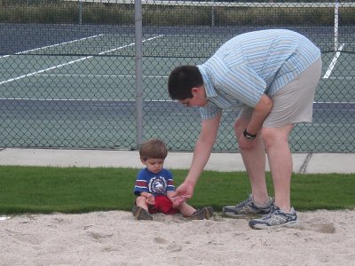 Mike explains the finer points of volleyball sand courts to Jack D.jpg