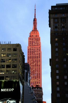 Empire State Building lit by setting sun
