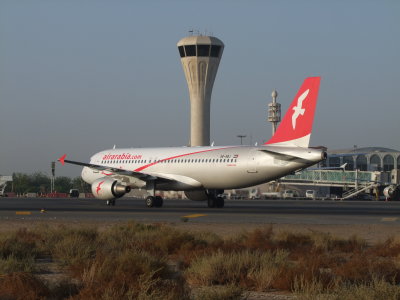 0724 25th October 08 Air Arabia A320 taxying onto Stand 10 at Sharjah Airport.jpg
