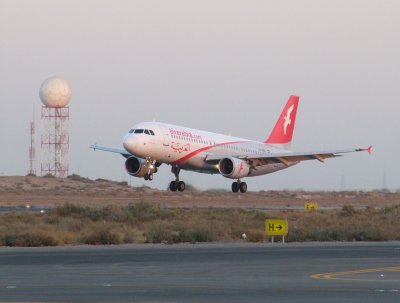 1716 19th November 08 Air Arabia A6-ABE landing at Sharjah Airport.jpg