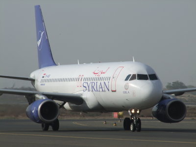 1613 19th February 09 Syrian landing at Sharjah Airport.jpg